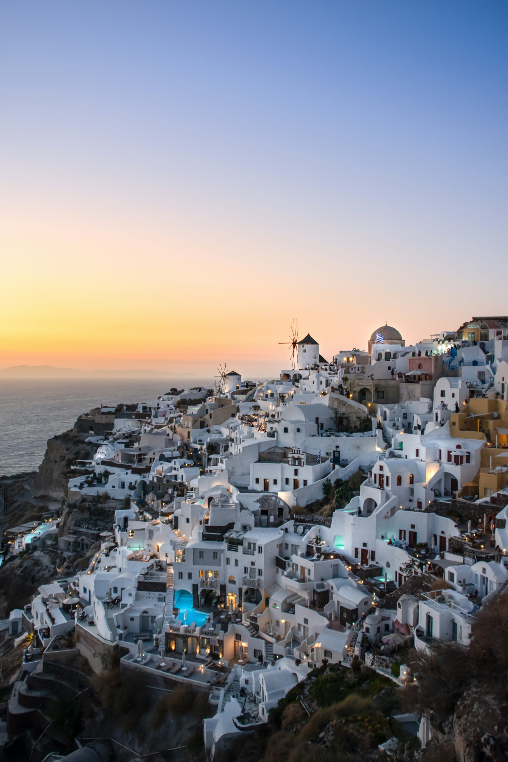The landscape of Oia, in Santorini Island, Greece (Photo by <a href="https://unsplash.com/@therawhunter?utm_content=creditCopyText&utm_medium=referral&utm_source=unsplash">Massimiliano Morosinotto</a> on <a href="https://unsplash.com/photos/white-and-brown-houses-near-body-of-water-during-daytime-mC8dmDg4YUo?utm_content=creditCopyText&utm_medium=referral&utm_source=unsplash">Unsplash</a>)